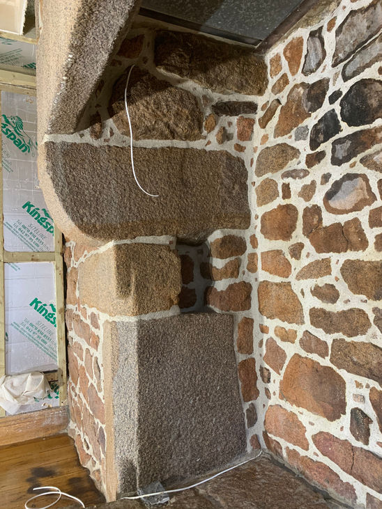 Restored granite corbel and alcove detail