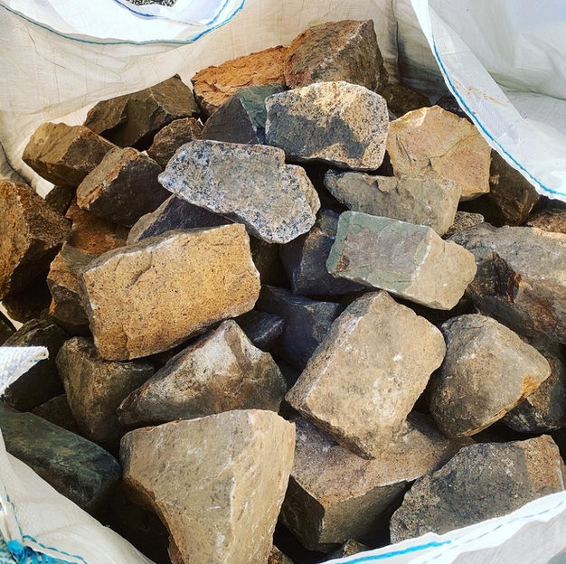 Raw granite stones for the rebuild