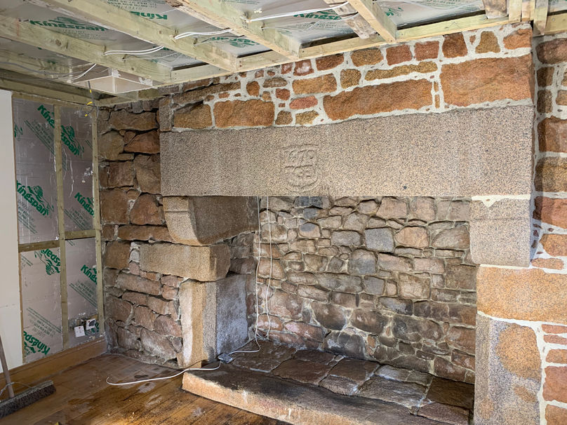 Fireplace during sandblasting and restoration