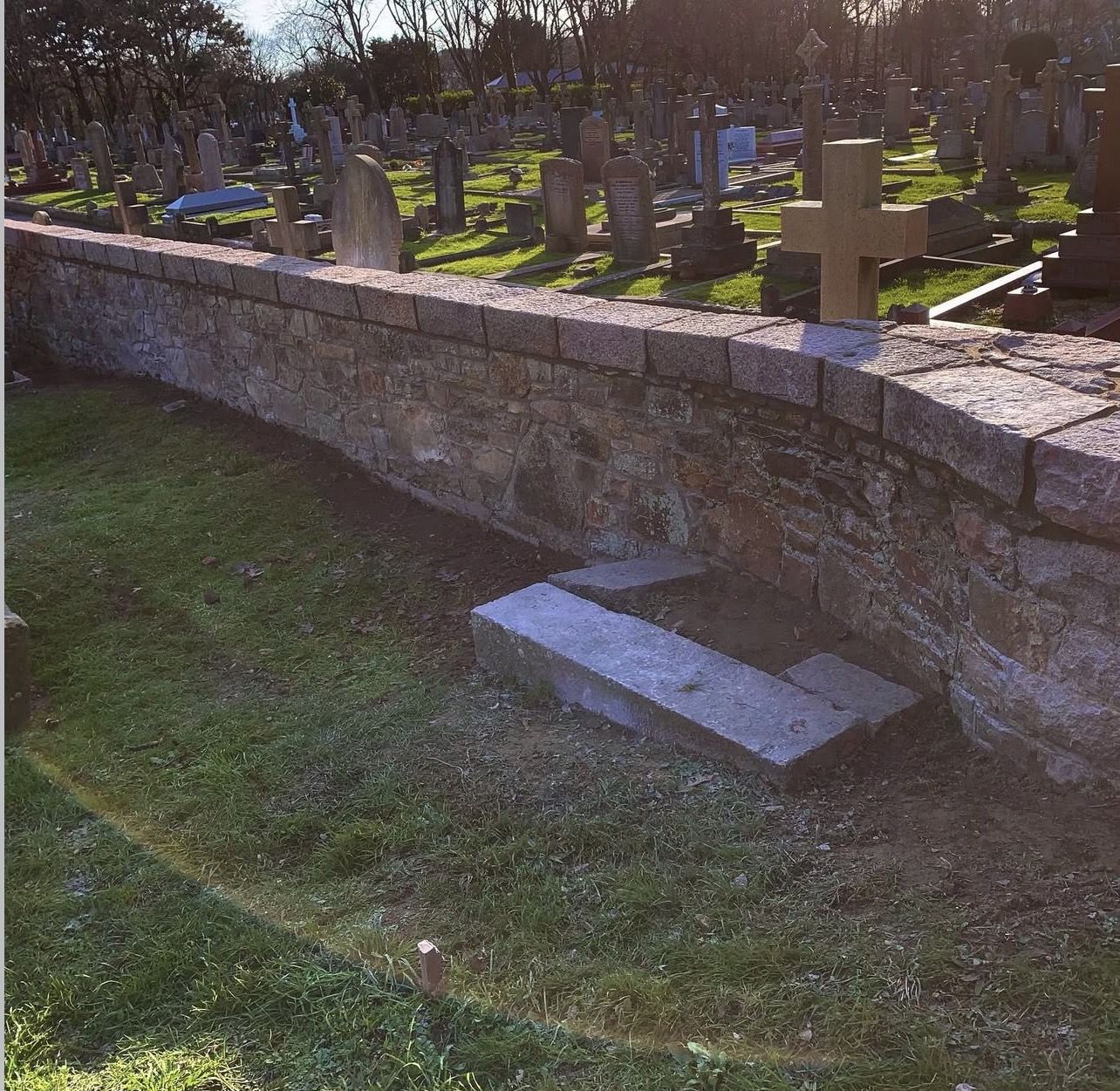 Cemetery Wall Restoration, after: completed stonework in Jersey