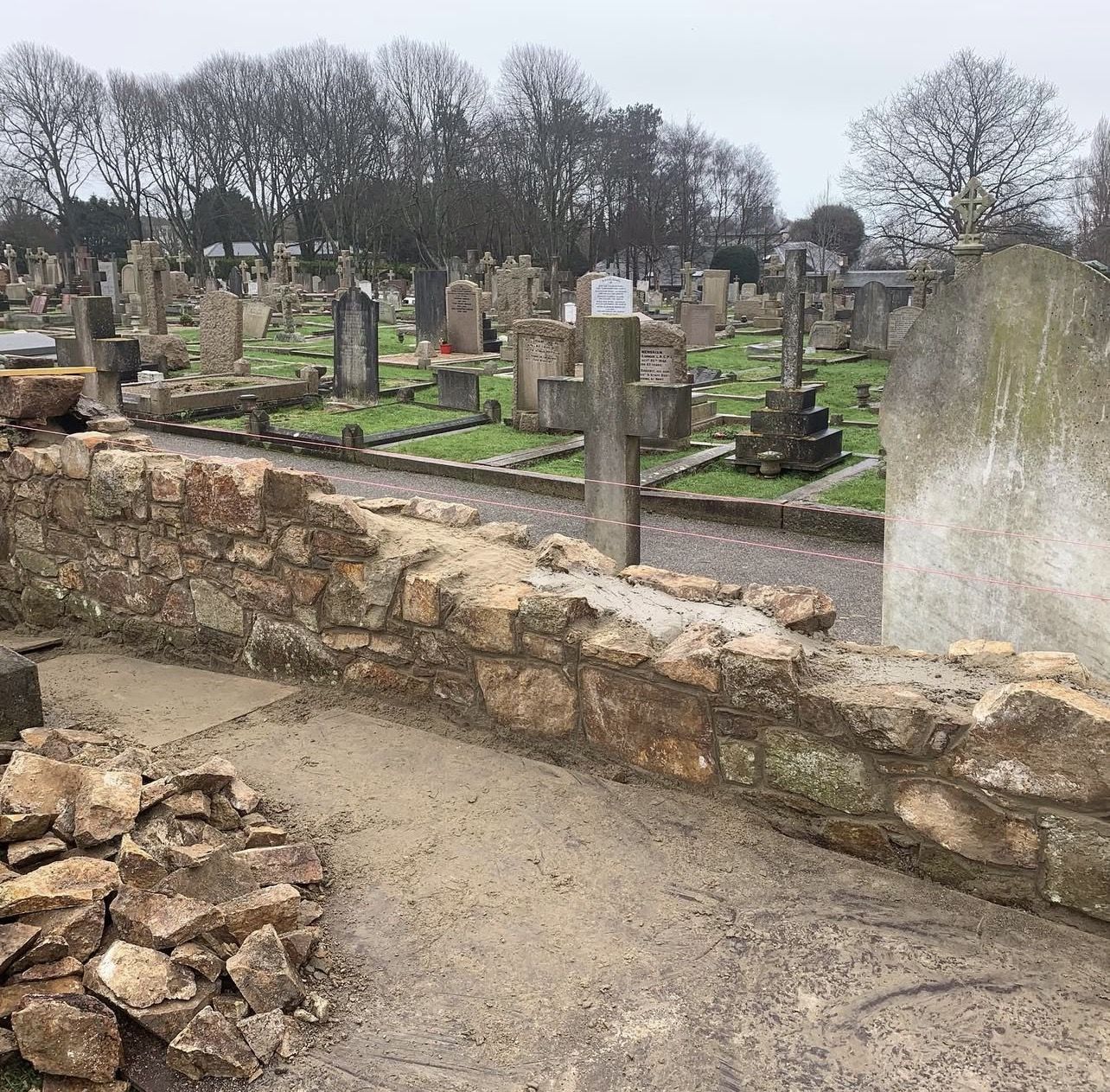 Cemetery Wall Restoration, before the work